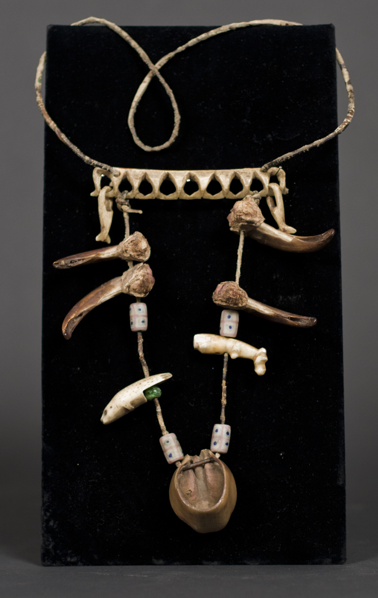 Shaman’s necklace including a Marquesas Islands putaiana and Inupiaq